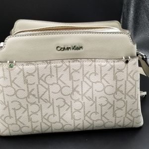 Calvin Klein Grey and White purse with adjustable strap